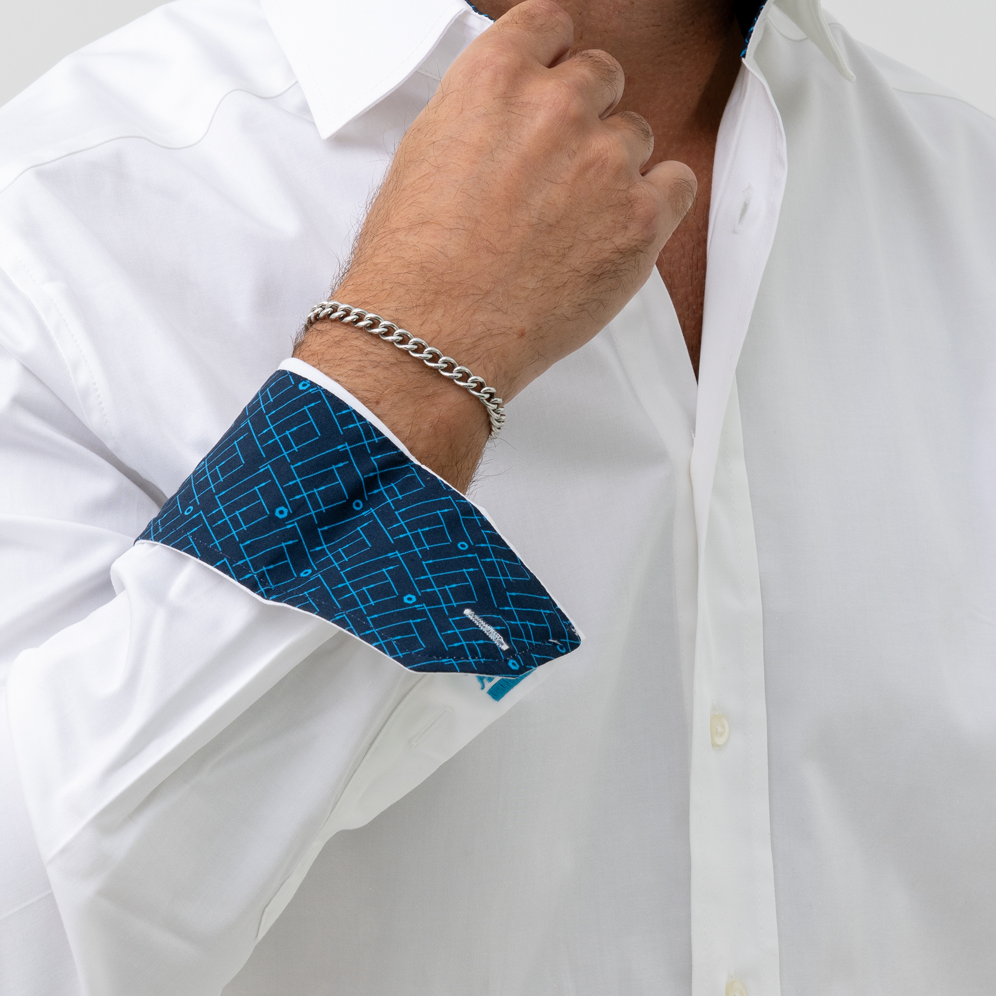 white business shirt with logo on sleeves